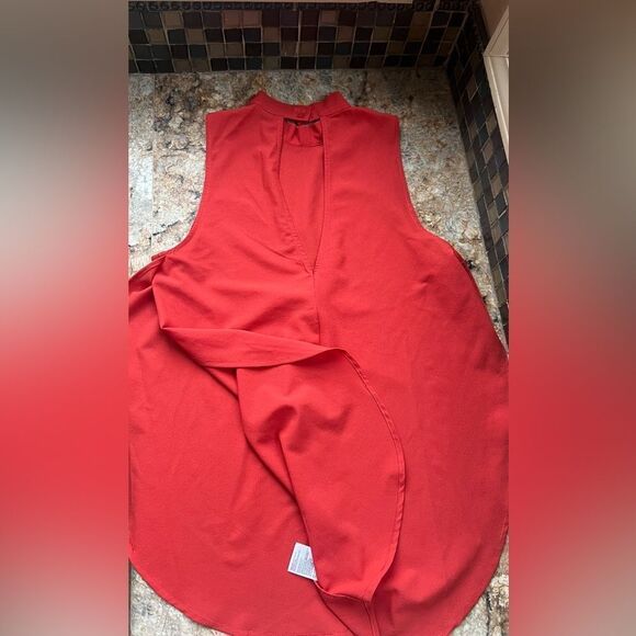 Paper crane, pumpkin colored high neck, high slit blouse - Picture 3 of 6